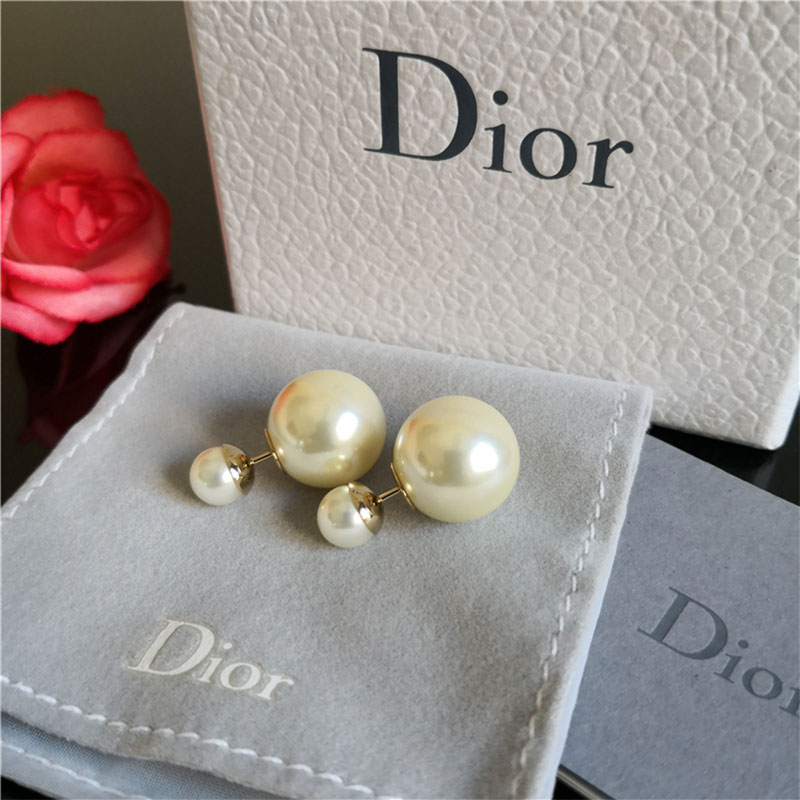 Side angle highlighting polished white metal on Dior Women Dior Tribales Earrings-White