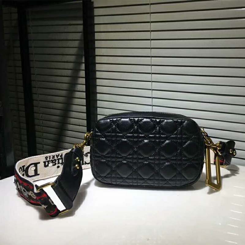 Close-up of signature quilted pattern on Dior Women Diorquake Clutch