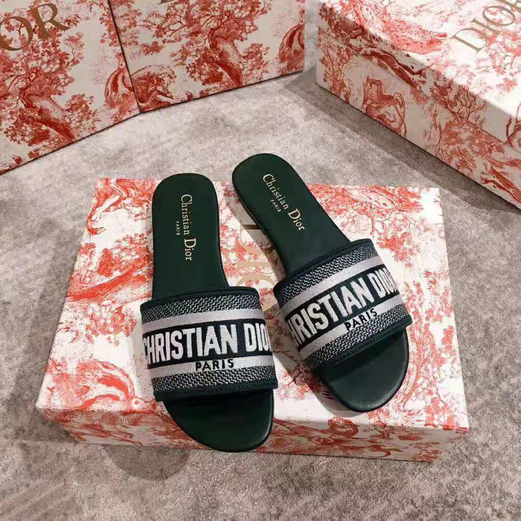 Top angle highlighting open back and rounded silhouette of Dior Women Dway Mule