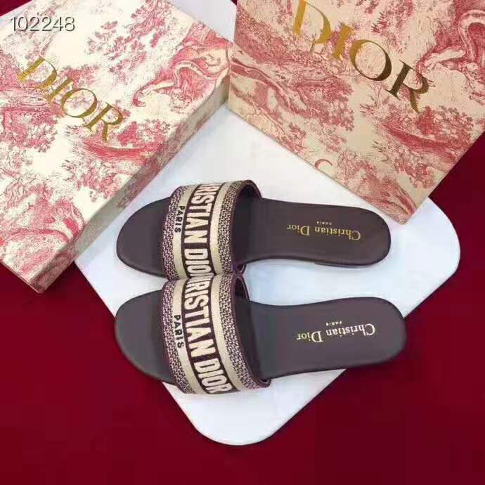 Close-up of maroon embroidery detail on Dior Women Dway Cotton Mule