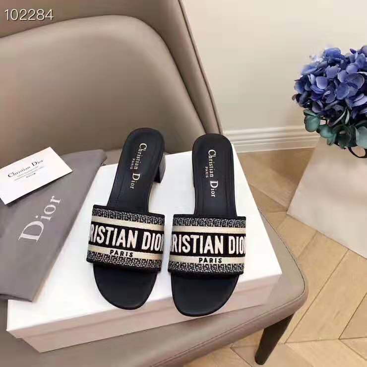 Rear angle of Dior Women Dway Mule in Embroidered Cotton-Navy with open back
