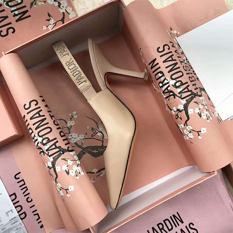 Close-up on signature studs of Dior Women J’Adior High-Heeled Nude Lambskin Studs 65mm Heel-Sandy