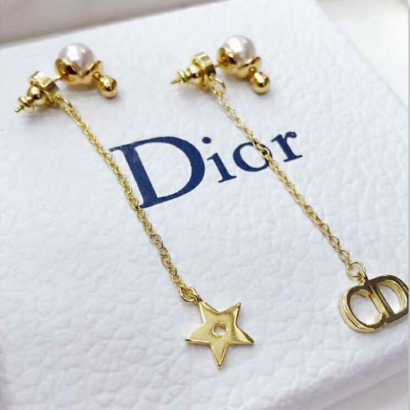 Close-up of Dior Women La Petite Tribale Earrings tribal medallion detail