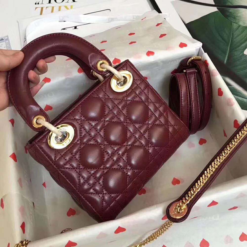 Side angle showcasing the structured silhouette of Dior Women MY ABCDIOR Lambskin Bag-Maroon