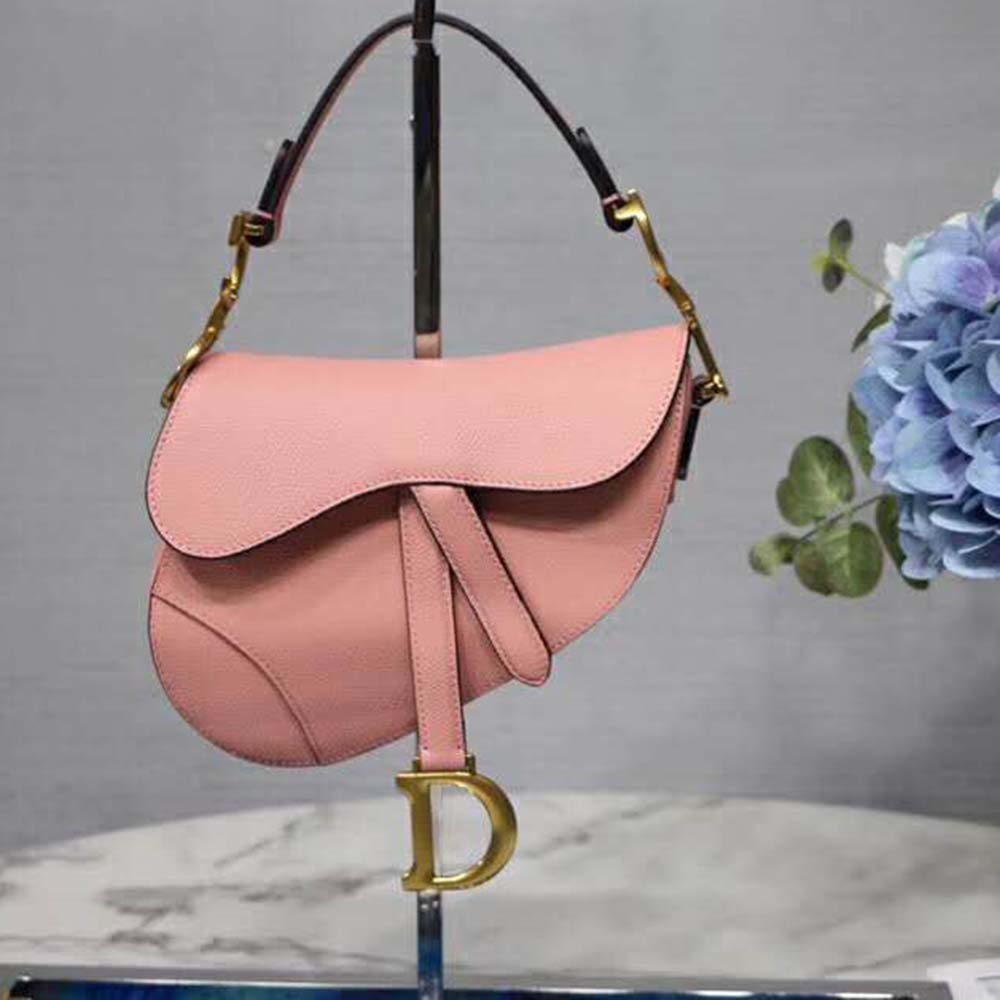 Close-up detail of silver-tone ‘D’ clasp on Dior Women Mini Saddle Bag