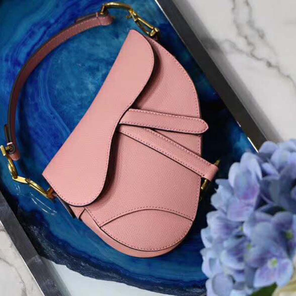 Side angle showing silhouette of Dior Women Mini Saddle Bag in Calfskin-Pink