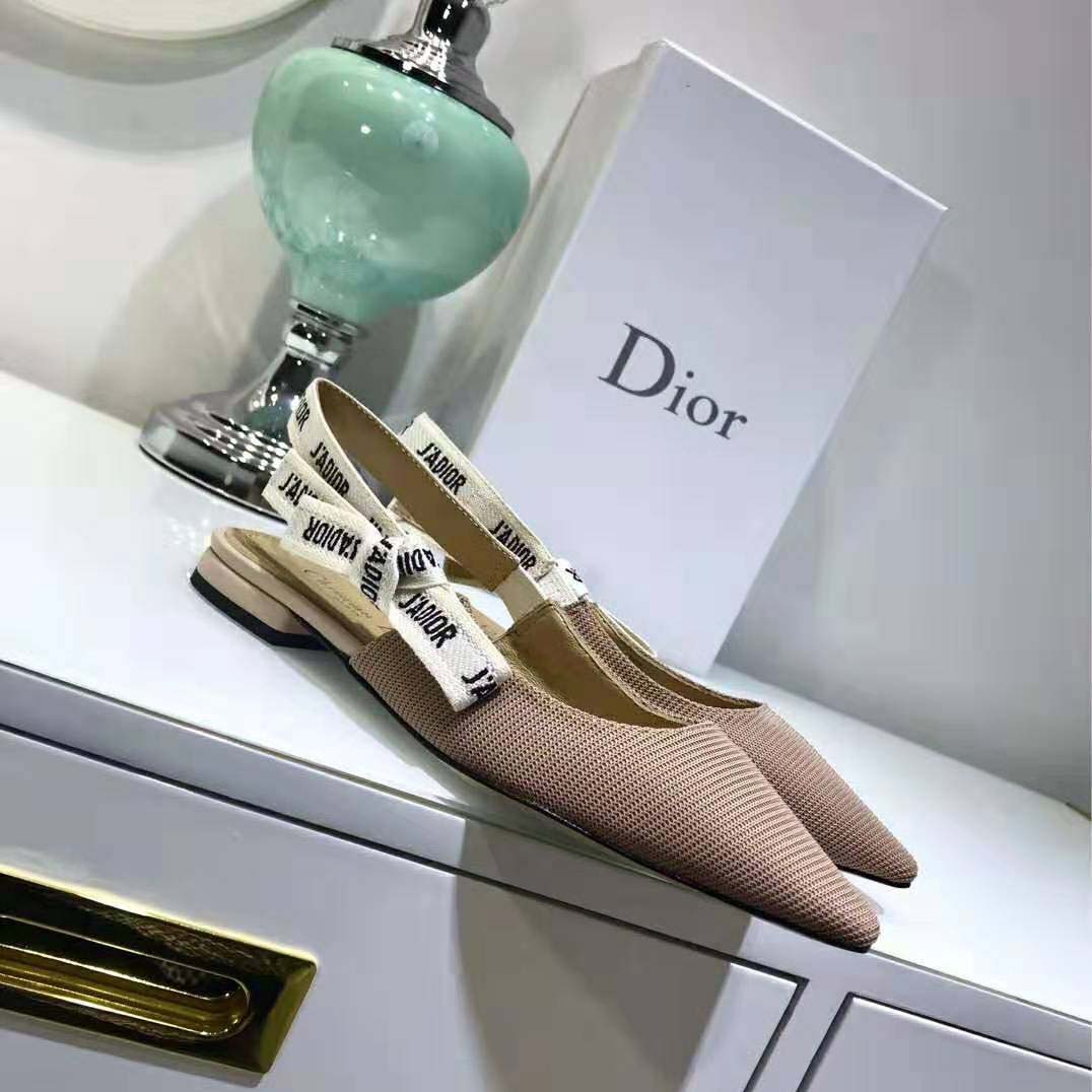 Close-up of embroidered J’adior ribbon on Dior Women ballerina