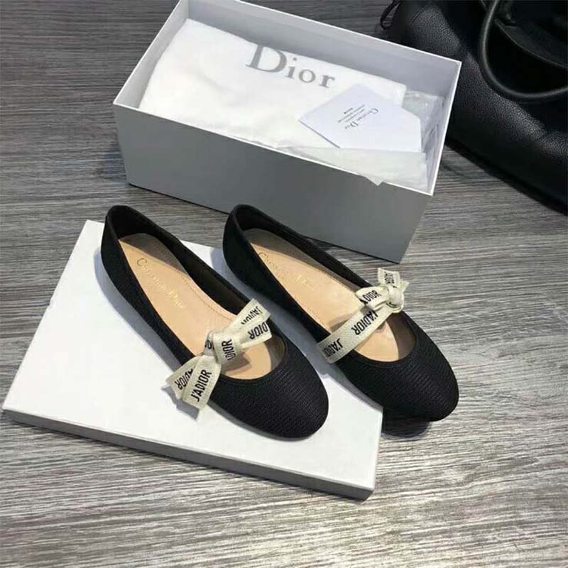 Top view showing black technical canvas and silhouette of Dior ballet pump