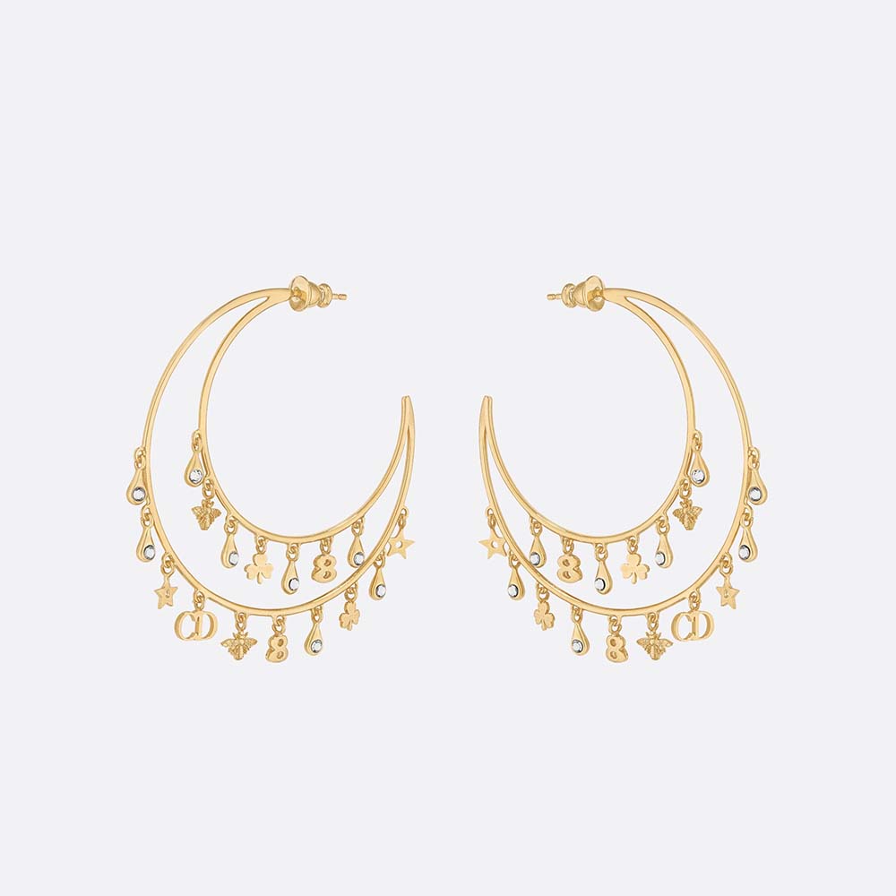 Close-up of Dior Women Sous Les Etoiles Earrings gold star detail