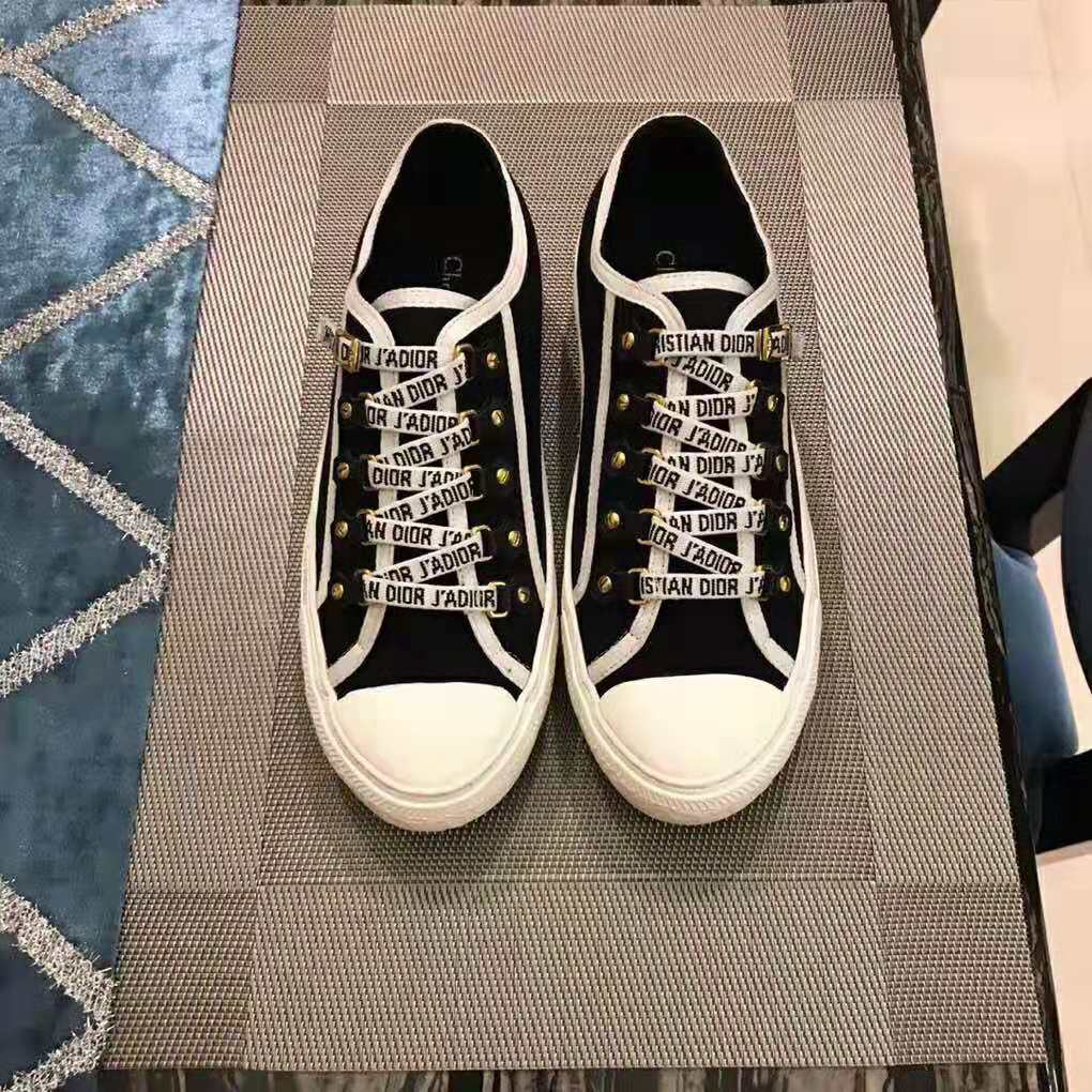 Top angle showing laces and silhouette of Dior Women Walk’N’Dior sneaker