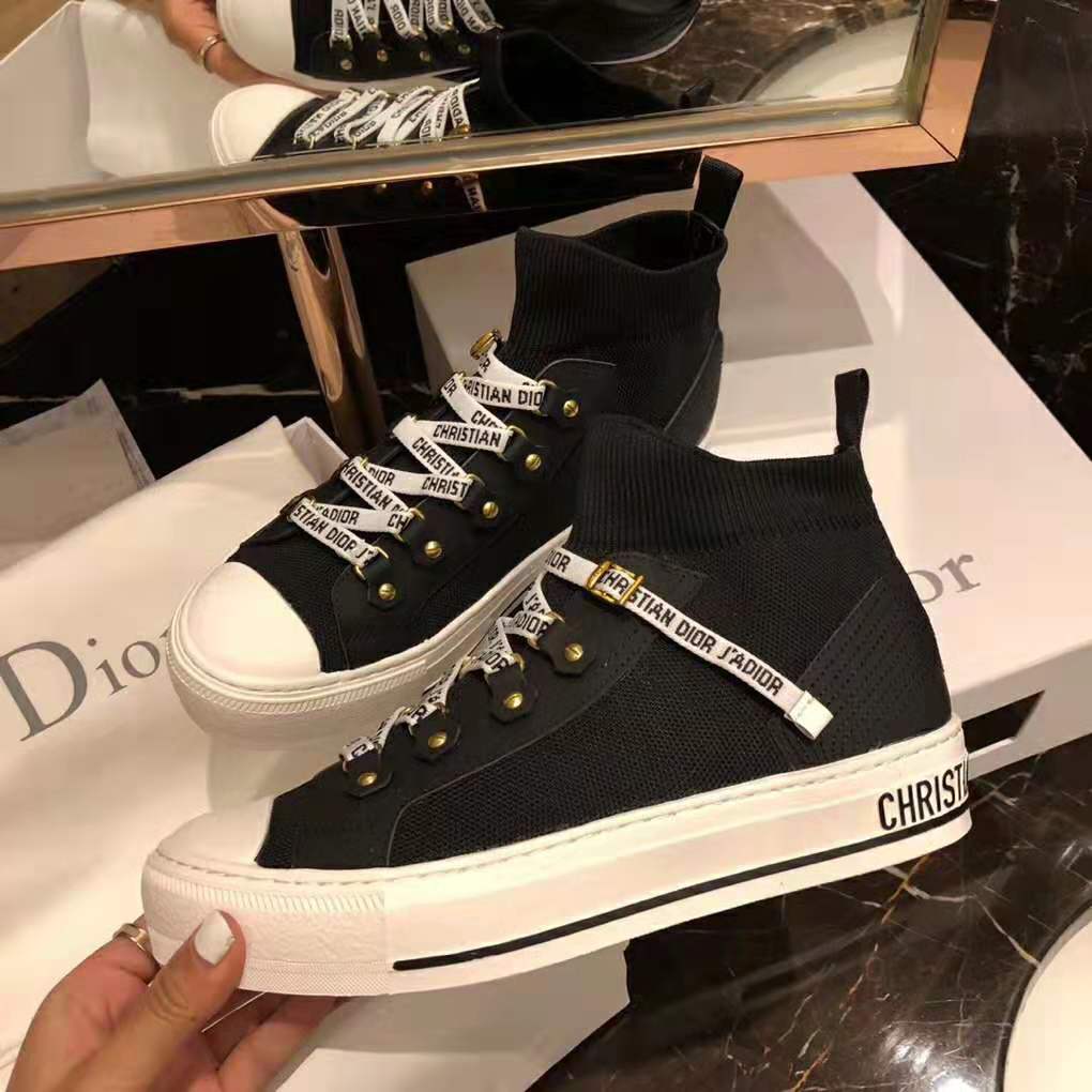 Top view showing black technical knit and mid-top silhouette