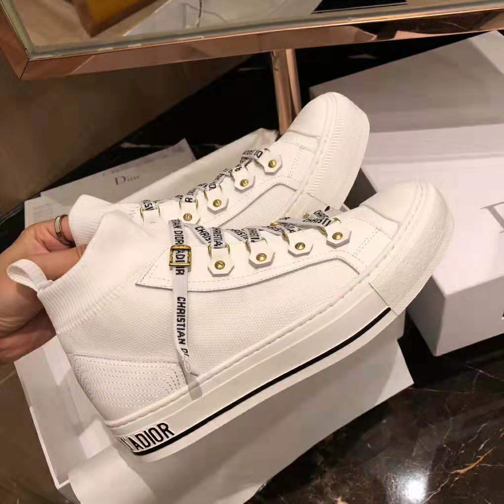 Overhead view showing laces and knit texture of Dior mid-top sneaker