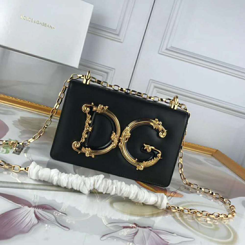 Close-up of black nappa leather and silver D&G logo hardware on bag