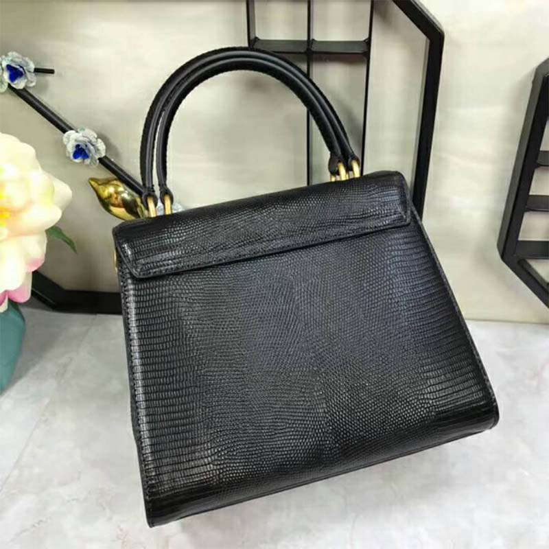 Side angle showing silhouette of Dolce Gabbana D&G Women Leather Welcome Handbag-Black