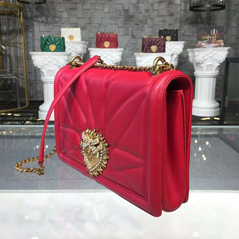 Close-up of gold-tone Devotion clasp on Dolce Gabbana D&G Women Medium Devotion Bag