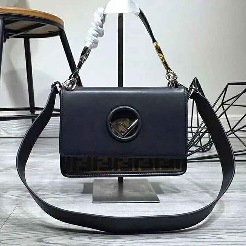 Close-up on gold-tone hardware and leather strap of Fendi KAN I F bag