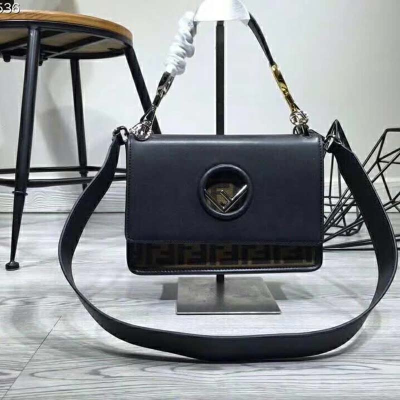 Side angle showing compact silhouette of Fendi KAN I F Top Flap Strap Bag
