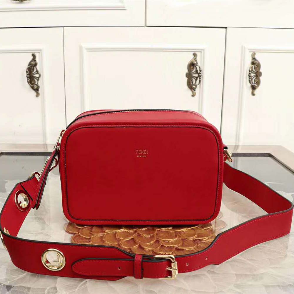 Side angle showing adjustable shoulder strap of Fendi Women Camera Case Leather Bag-Red