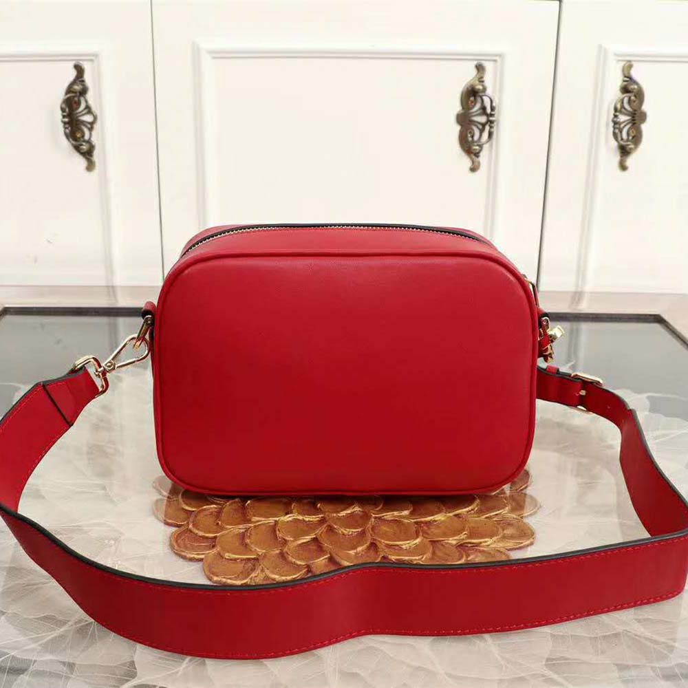 Close-up of red leather texture and zip closure on Fendi Women Camera Case Leather Bag-Red