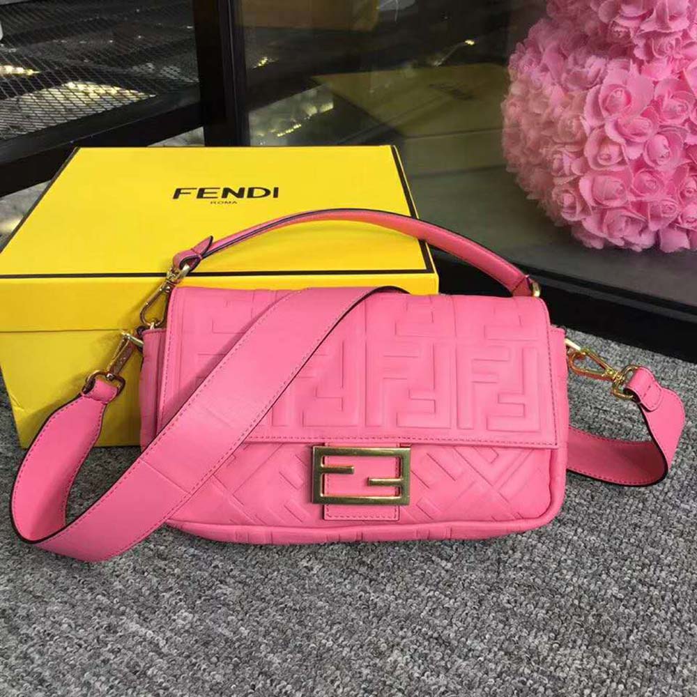 Close-up of gold-tone buckle on Fendi Women Iconic Baguette Leather Bag