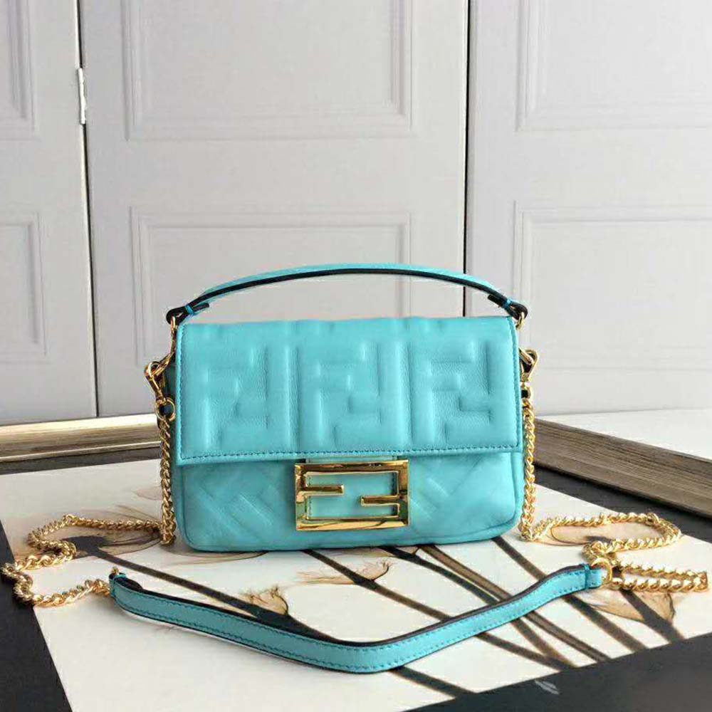 Close-up of gold hardware on Fendi Women Iconic Baguette Leather Bag Aqua
