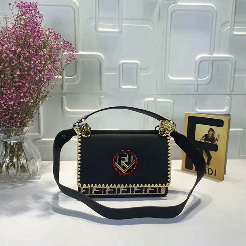 Close-up of gold-tone Fendi clasp on KAN I F Exotic Black bag
