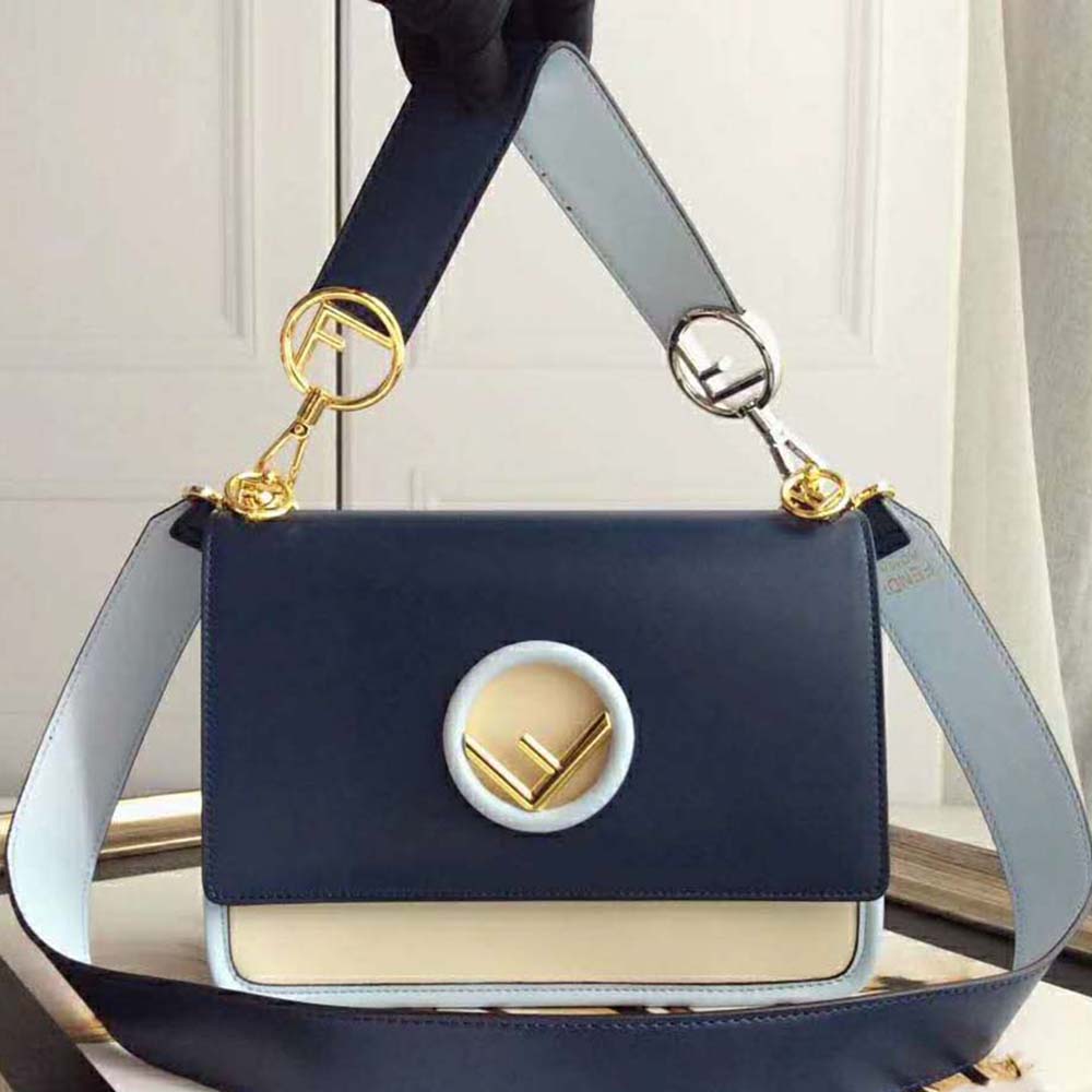 Close-up of gold hardware and flap on Fendi Women Kan I F Leather Bag