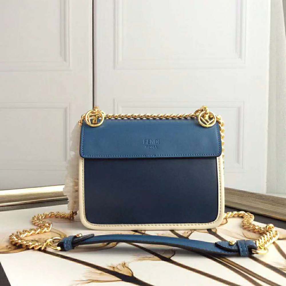 Side angle showing adjustable strap of Fendi Kan I F mini-bag