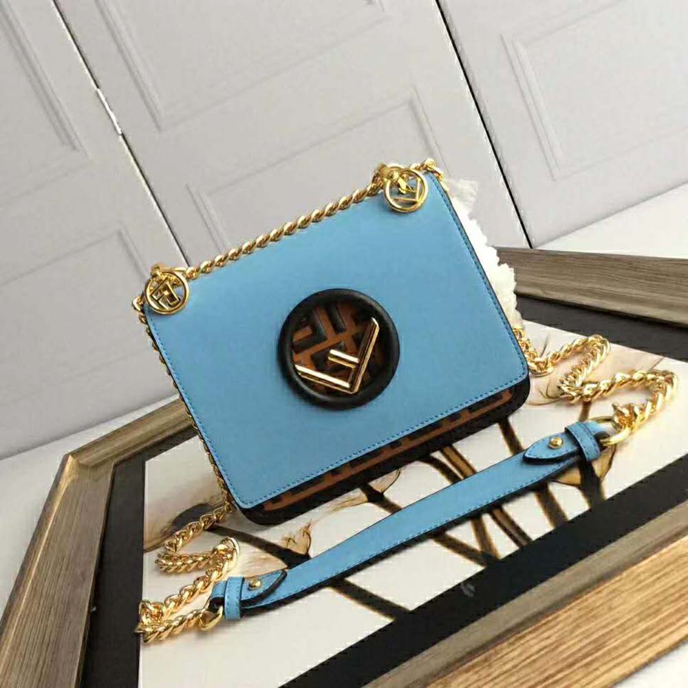 Close-up of FF logo clasp on Fendi Women Kan I F Small Pale Blue Leather Mini Bag
