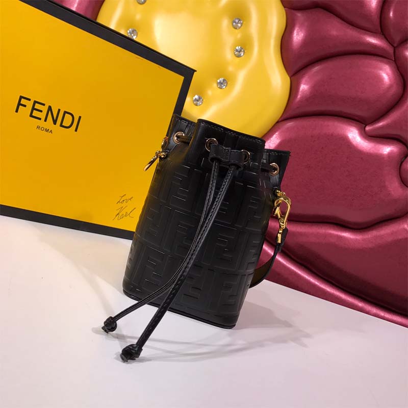 Close-up of signature gold-tone closure on Fendi Women Mon Tresor Black Leather Mini-Bag