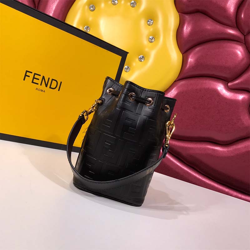 Side profile showing adjustable strap of Fendi Women Mon Tresor Black Leather Mini-Bag