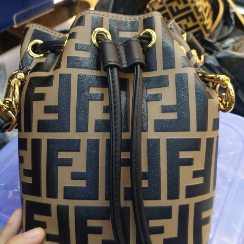 Side angle showing silhouette and strap of Fendi Women Mon Tresor Mini Bag