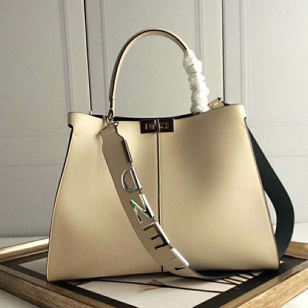 Close-up of gold-tone hardware on Fendi Women Peekaboo X-Lite Regular-White