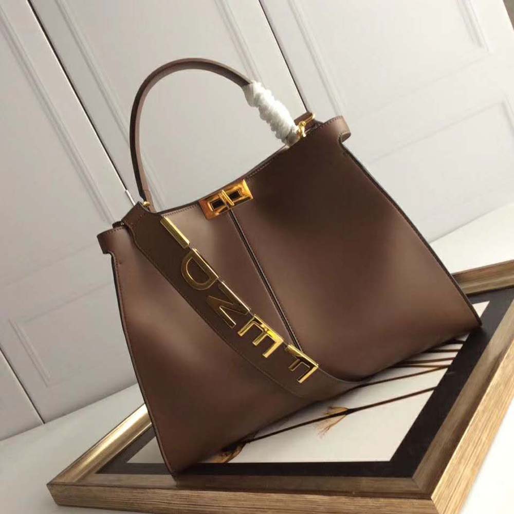 Side view showing dual compartments of Fendi Women Peekaboo X-Lite Regular-Brown
