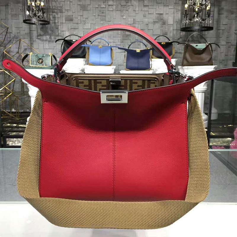 Close-up of gold-tone clasp on Fendi Women Peekaboo X-Lite Regular Leather Bag-Red