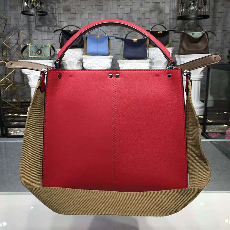 Side angle showing textured leather on Fendi Women Peekaboo X-Lite Regular Leather Bag-Red