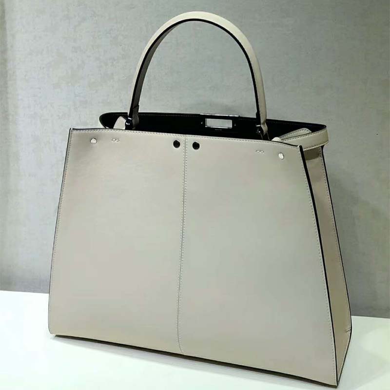 Side profile showing leather texture on Fendi Women Peekaboo X-Lite bag