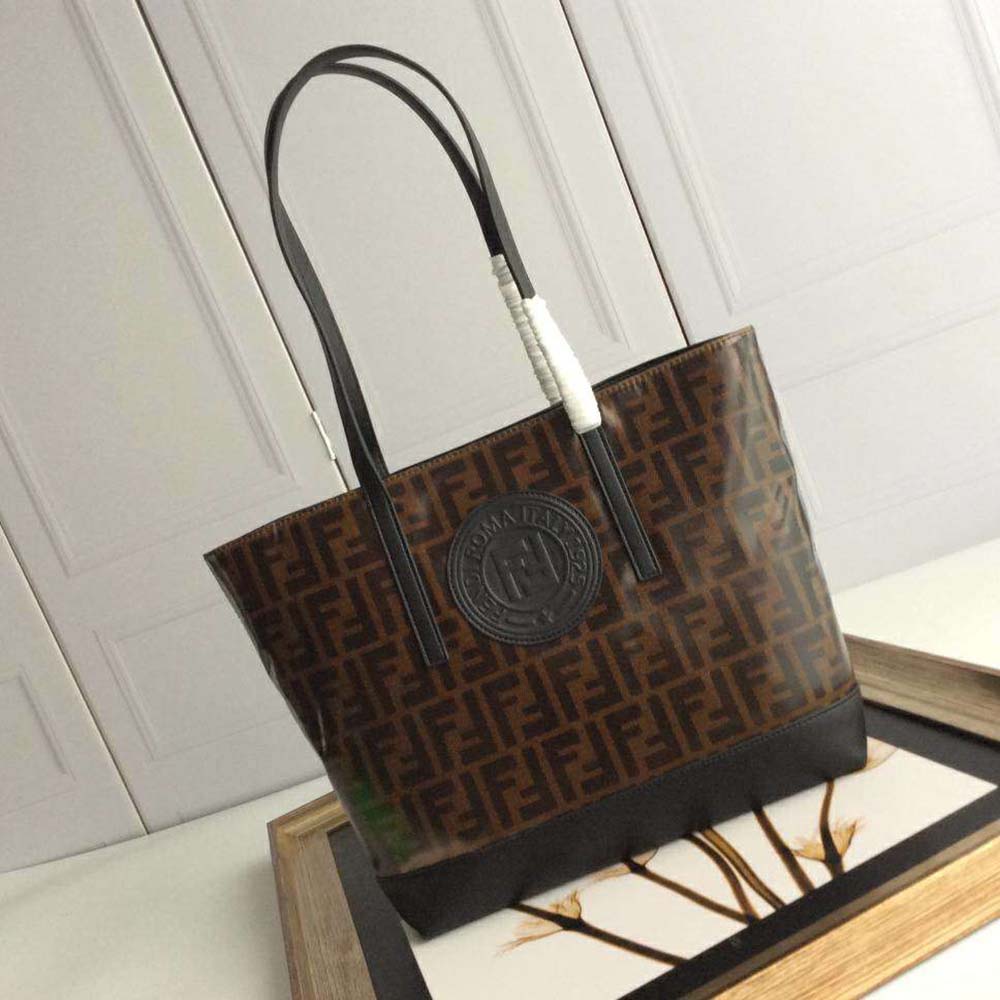 Side profile of Fendi Women Shopping Logo Leather Shopper-Black with shoulder strap