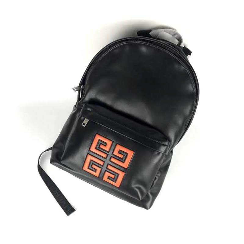Close-up of black leather texture and silver 4G hardware on Givenchy backpack