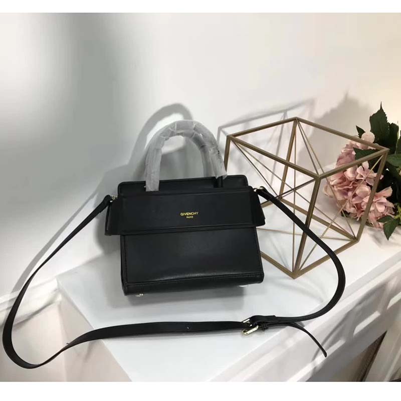 Side profile showing compact silhouette of Givenchy Mini Horizon Bag