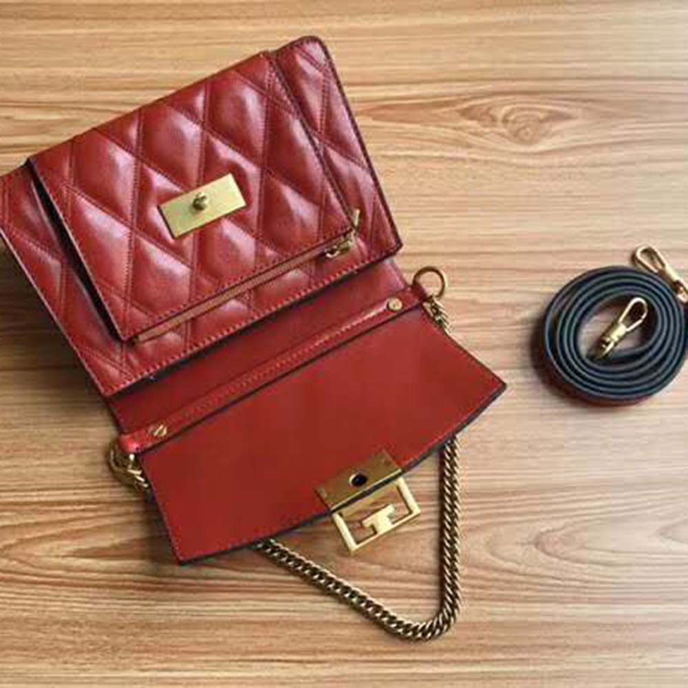 Side angle showing adjustable shoulder strap of Givenchy GV3 Orange bag