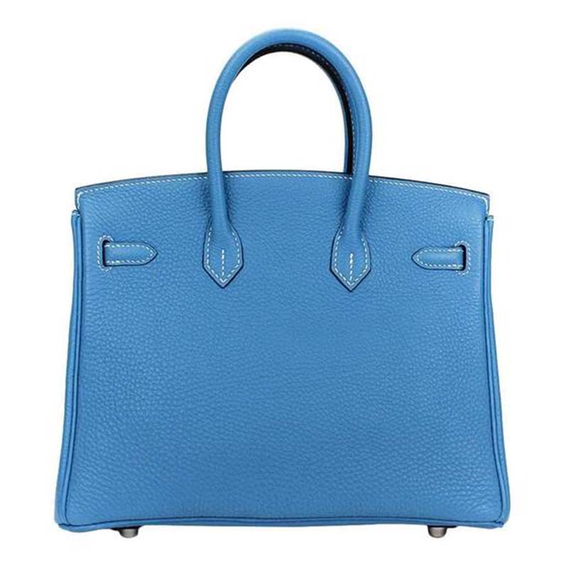 Close-up of silver hardware and blue Togo leather texture on Hermes Birkin 25