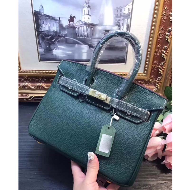 Side view showing silhouette of Hermes Birkin 25 Green bag