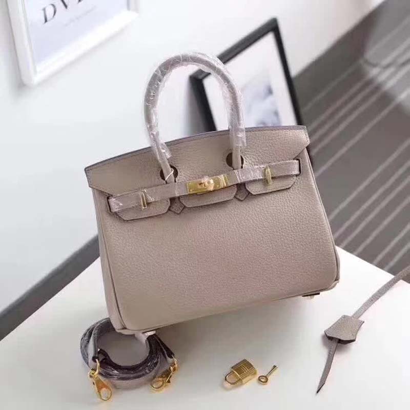 Close-up of gold hardware detail on Hermes Birkin 25 Bag in green