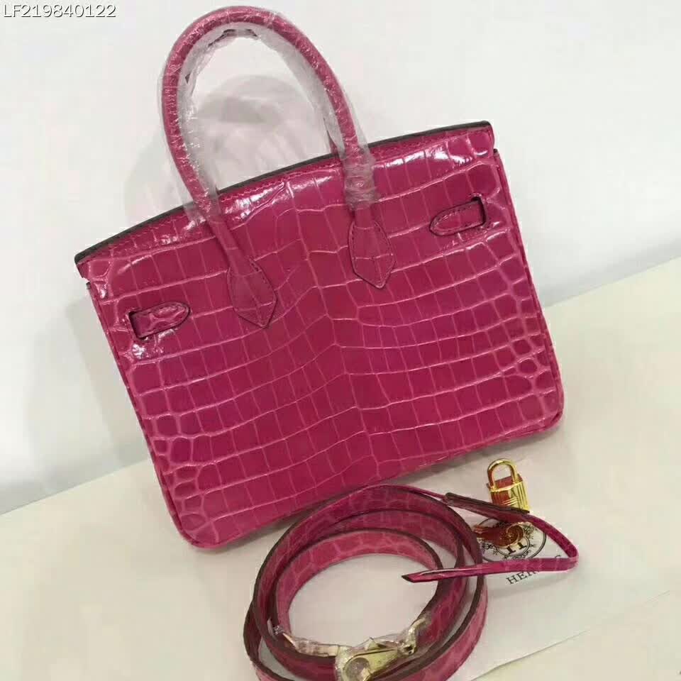 Side profile showing structure of Hermes Birkin 30 Bag in pink
