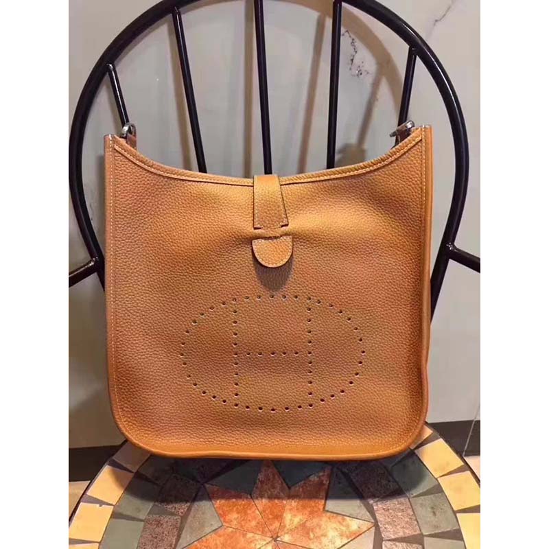 Close-up of perforated 'H' detail on Hermes Evelyne III 33 bag