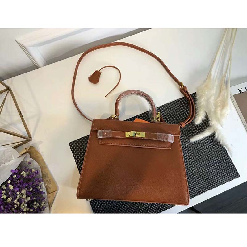 Side profile showing structured silhouette of Hermes Kelly Sellier 32 Bag