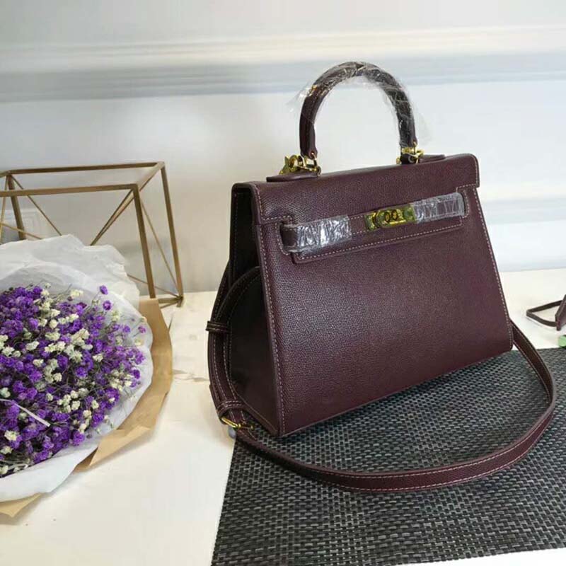Side angle showing structured silhouette of Hermes Kelly Sellier 32 Bag