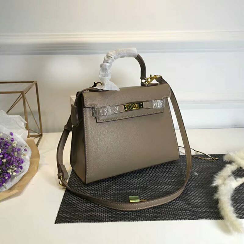 Side angle showing structured silhouette of Hermes Kelly Sellier 32 Bag