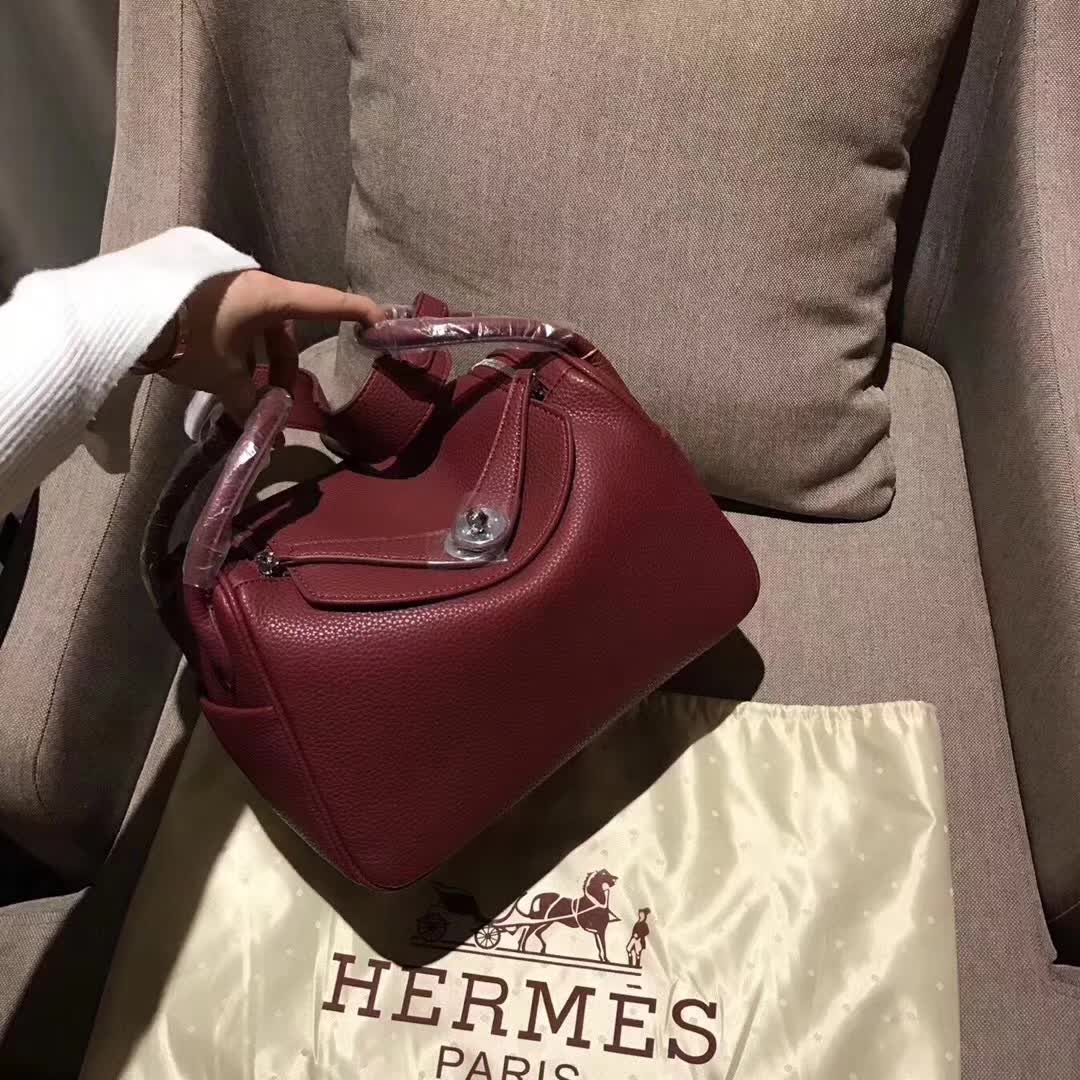 Side profile showing adjustable strap on Hermes Lindy 30 Leather Bag-Purple